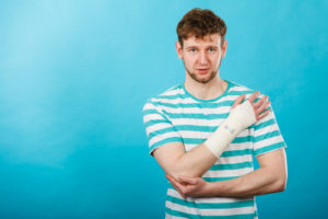 Man with injured arm